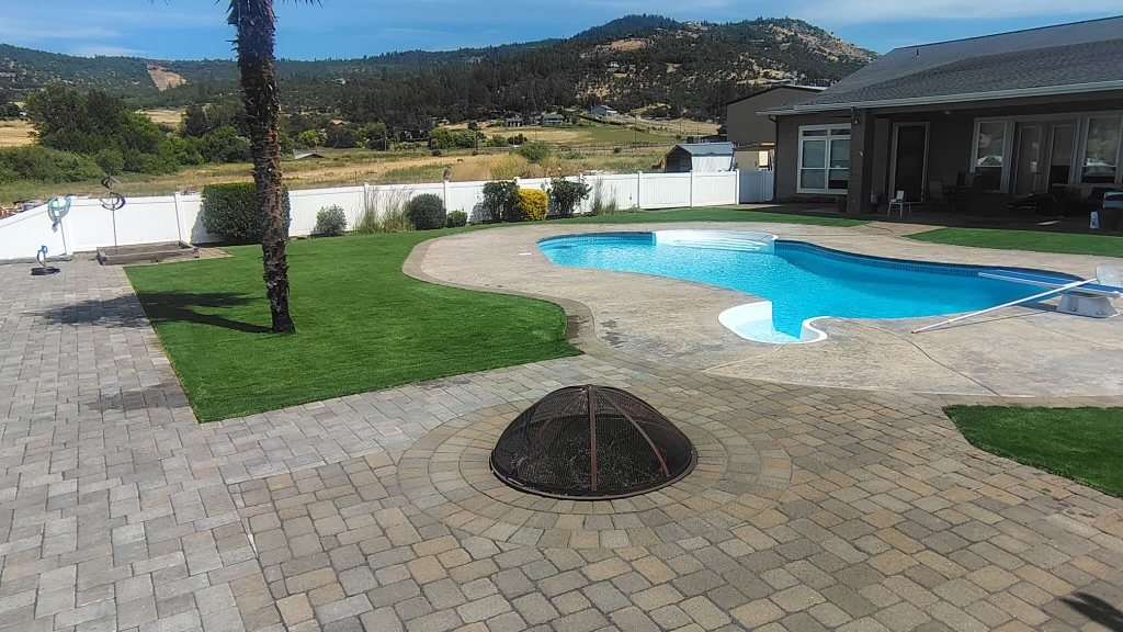 Paver pool deck with artificial turf and gas fire pit, Medford